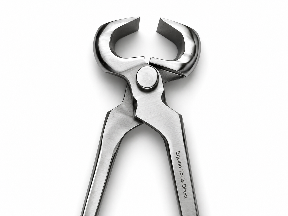 Open jaw angle view of farrier hoof nippers showing the cutting edges