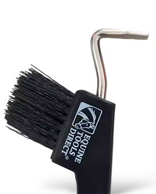 Angled view of Equine Tools Direct horse hoof pick showing metal hook tip, stiff brush, and black ergonomic handle with brand logo