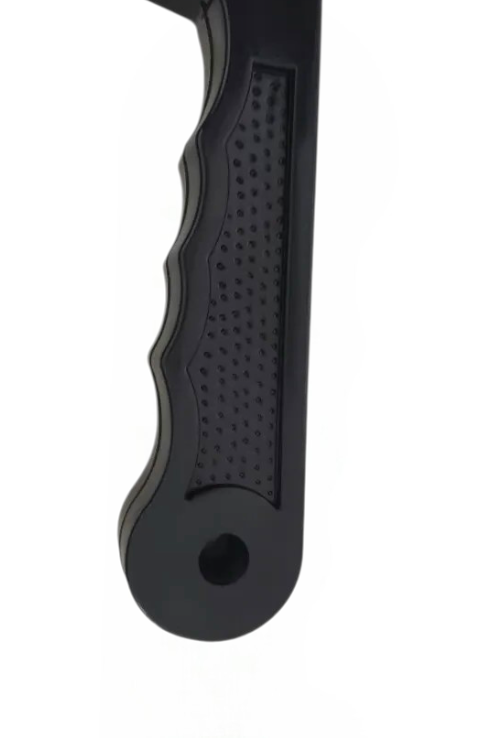 Close-up of ergonomic black grip-texture handle with hanging hole on Equine Tools Direct horse hoof pick with brush