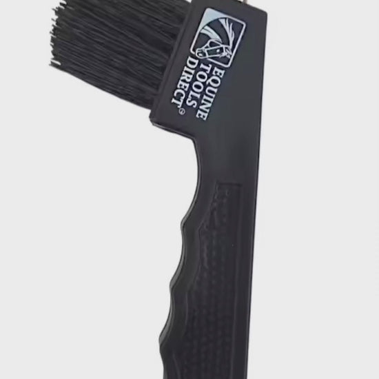 Demonstration of horse hoof pick with brush by Equine Tools Direct showing cleaning performance and ergonomic grip