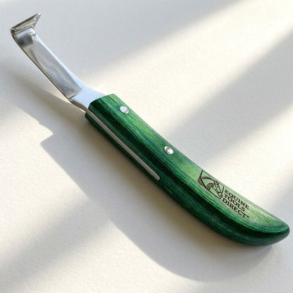 Equine Tools Direct straight hoof knife with green handle 
and rhino hook blade on flat surface with natural light